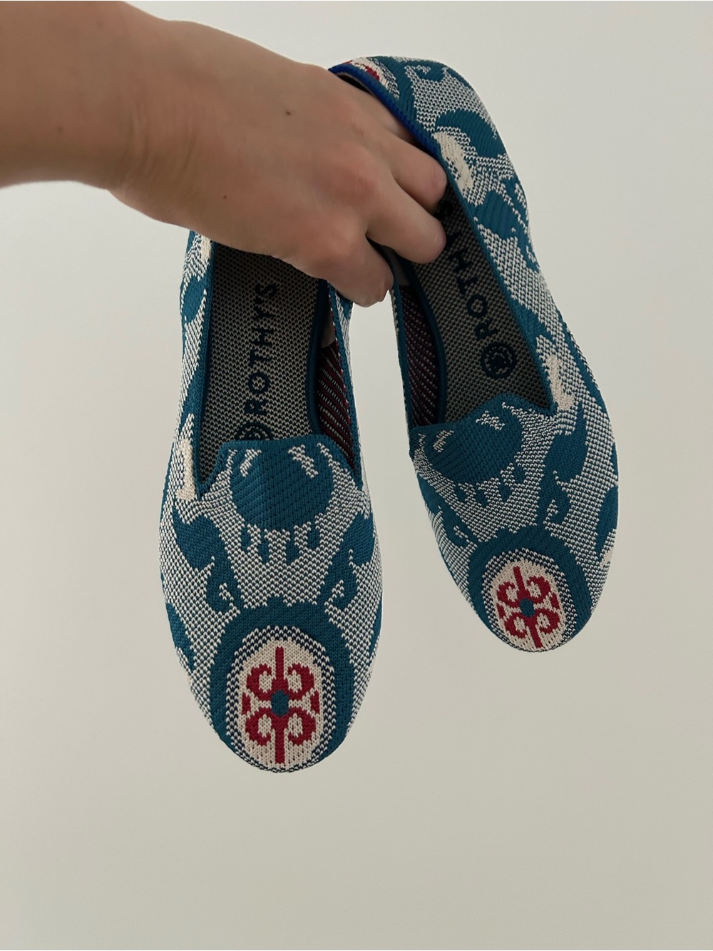 Rothy's Teal and White Patterned Slip-On Flats with Red Medallion - Picture 5 of 5